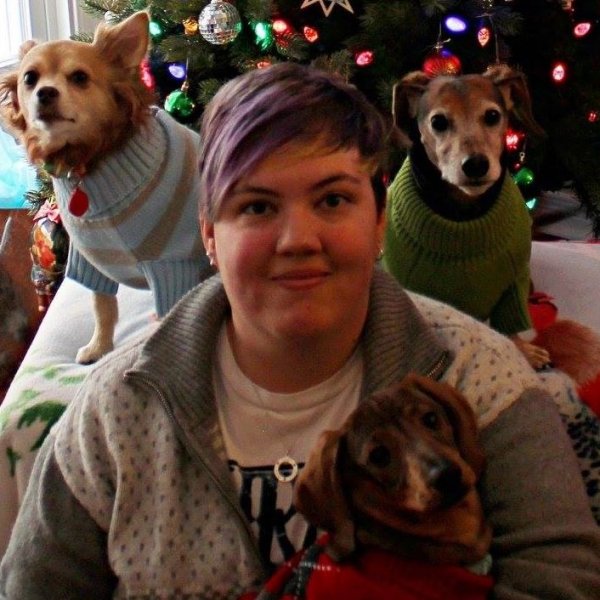Laura with her dogs Dwight, Charlie & Emma